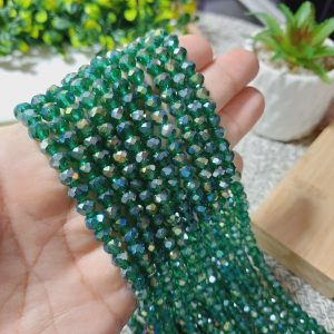 (1005-0118) Cristal rondel verde traslucido dorado 6mm