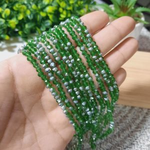 (1005-0087) Cristal rondel verde traslucido y plateado 4mm