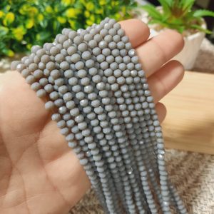 (1005-0076) Cristal rondel color gris 4mm