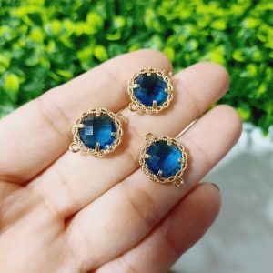Dije de zircón azul celeste redondo con enchape de 18k