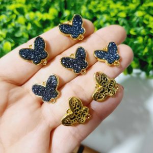 Dije de mariposa negra enchape de 18k