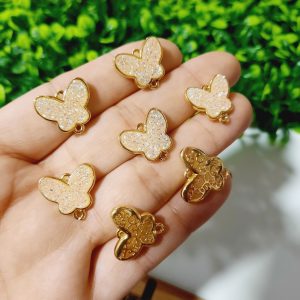 Dije de mariposa blanca enchape de 18k