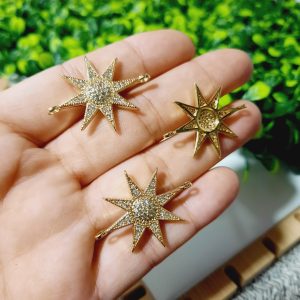 Dije de estrella grande en  enchape de 18k