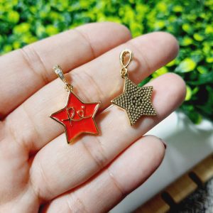 Dije de fé en forma de estrella con enchape