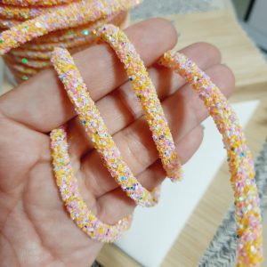 Cordón lurex decorado  color melón pálido